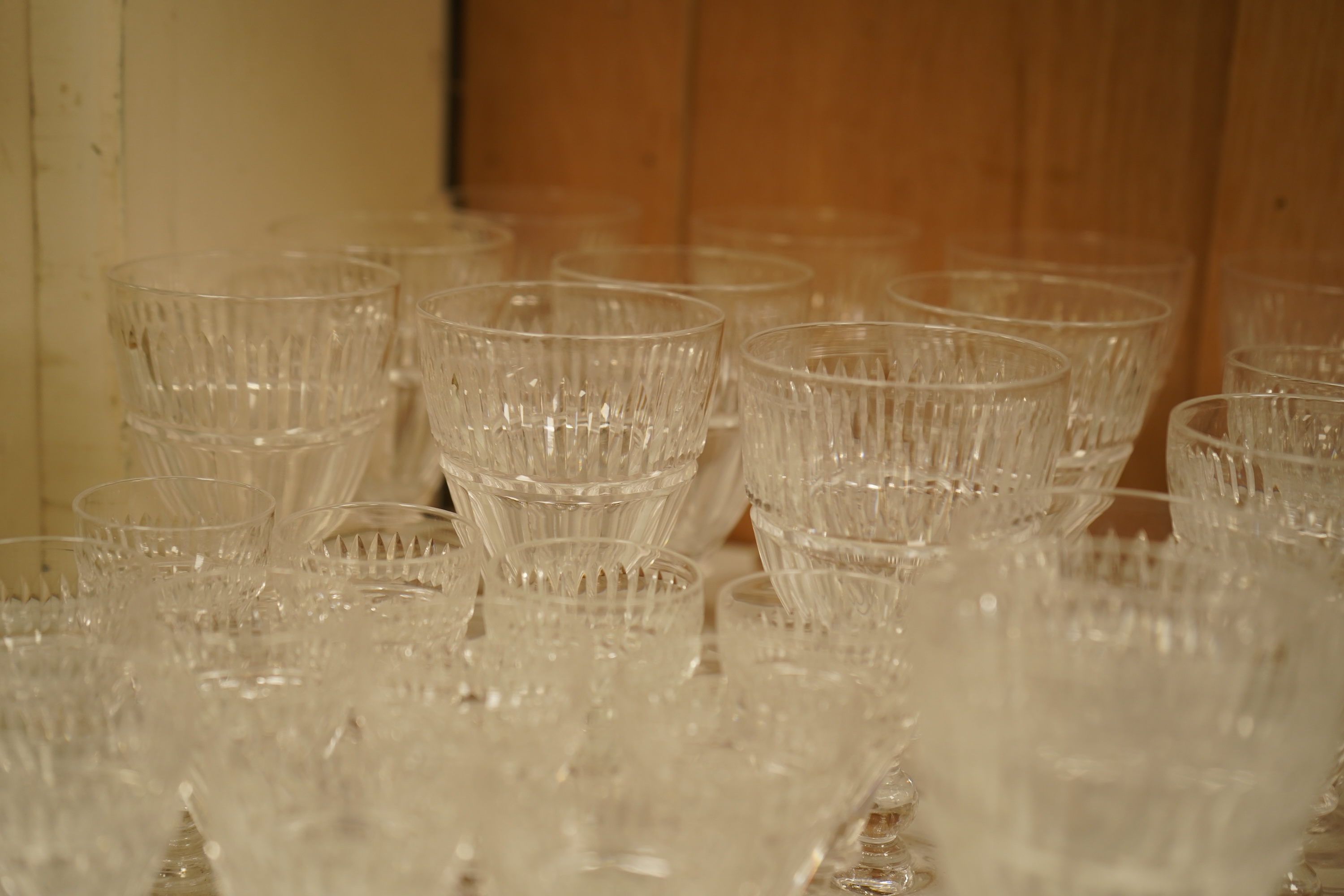 A part suite of 19th century cut glass drinking glasses, largest 13cm high
